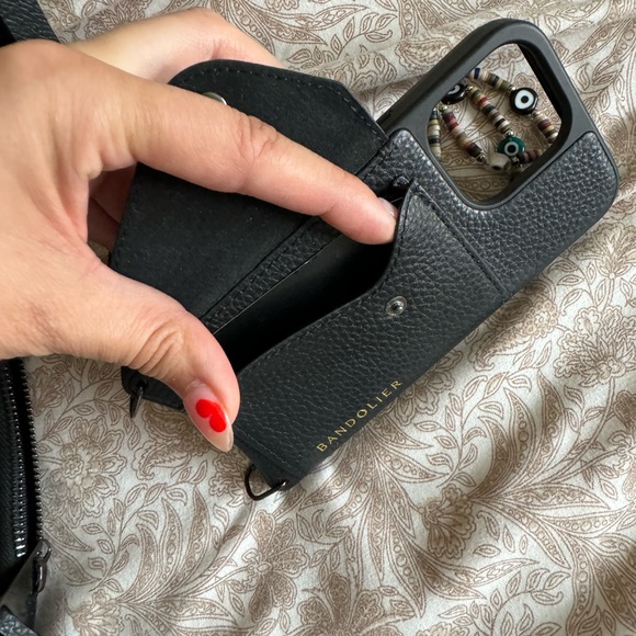 Bandolier case for iPhone crossbody case and AirPods case.